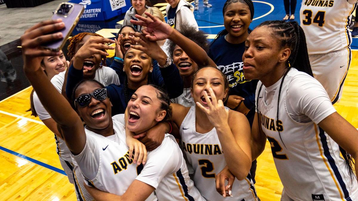St. Thomas Aquinas players react after defeating Charlotte 49-35 during the Class 6A state Girl’s basketball championship game at RP Funding Center in Lakeland, Florida, on Saturday, February 25, 2023.