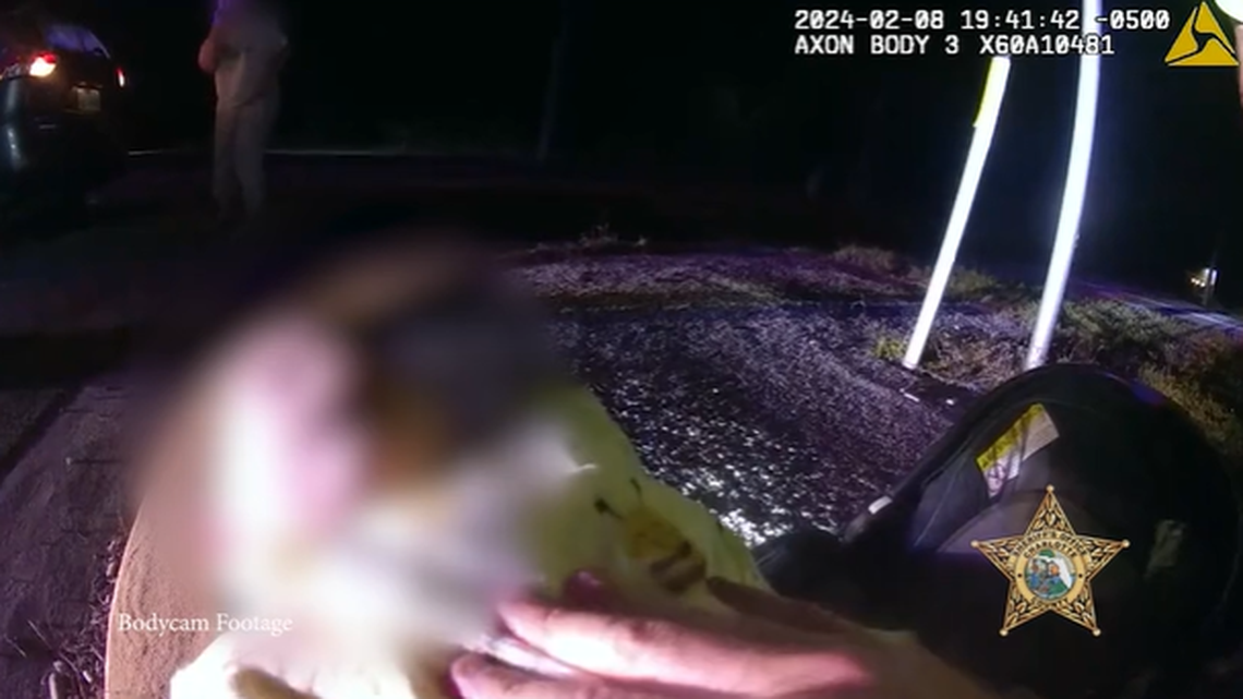 After pulling the baby from the vehicle, the deputy started chest compressions until paramedics arrived, body camera footage shows.