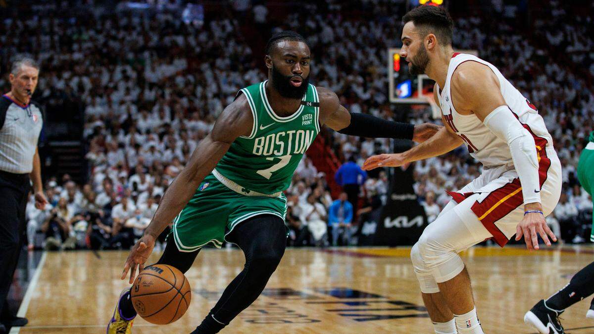Boston Celtics guard Jaylen Brown (7) drives against Miami Heat guard Max Strus (31) during the first quarter of Game 7 of the NBA Eastern Conference Finals series in Miami, Florida, on Sunday, May 29, 2022.