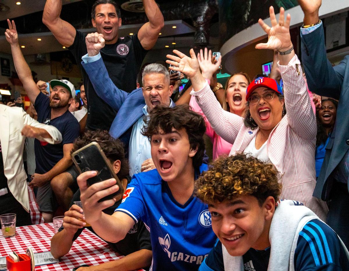 Soccer fans along with local elected officials react to Miami being selected as one of the cities for the FIFA 2026 World Cup venue during a watch party at Fritz & Franz Bierhaus in Coral Gables, Florida, on Thursday, June 16, 2022.
