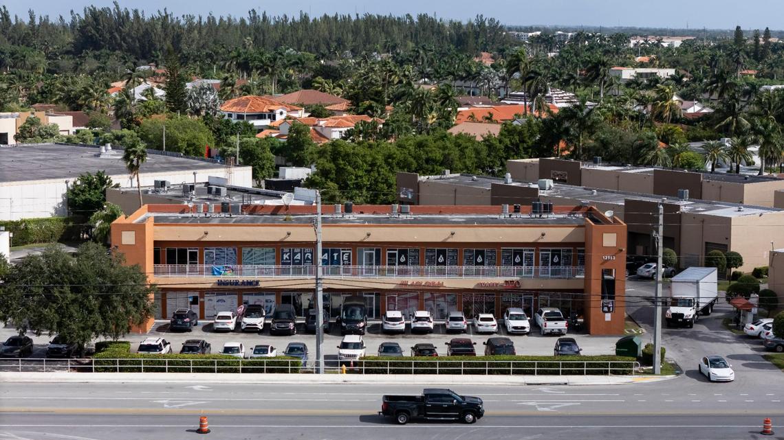 A general view of the shopping center where New Behavior Health Direction, a mental health clinic, is based, Thursday, Oct. 31, 2024, in Hialeah, Fla. The clinic’s owner has been sentenced to more than five years in prison in a Medicaid fraud scheme.