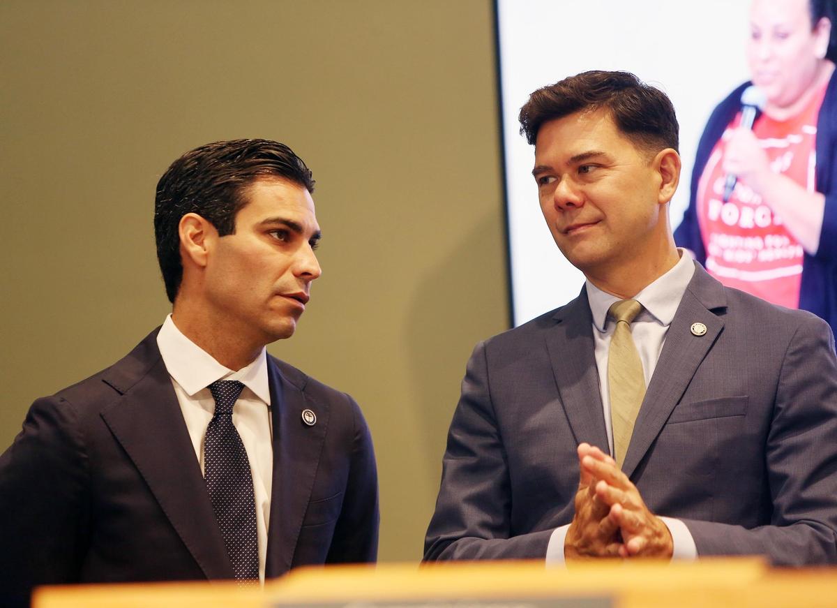 Miami Mayor Francis Suarez with commissioner Ken Russell during the city of Miami commission meeting on Thursday, May 10, 2018.