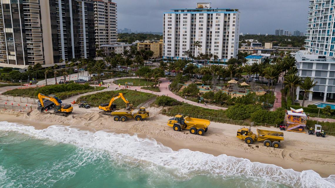 The U.S. Army Corps of Engineers dumps new sand from Central Florida along the Miami Beach shoreline near 65th Collins Avenue on Monday, January 13, 2019.
