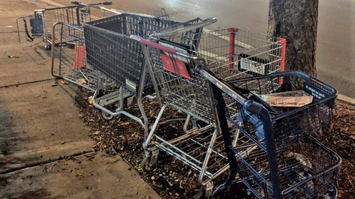 Shopping carts at the intersection of Coral Way and 32nd Avenue. Miami Commissioner Manolo Reyes has proposed an ordinance to hold grocery store owners more accountable for carts on city property.