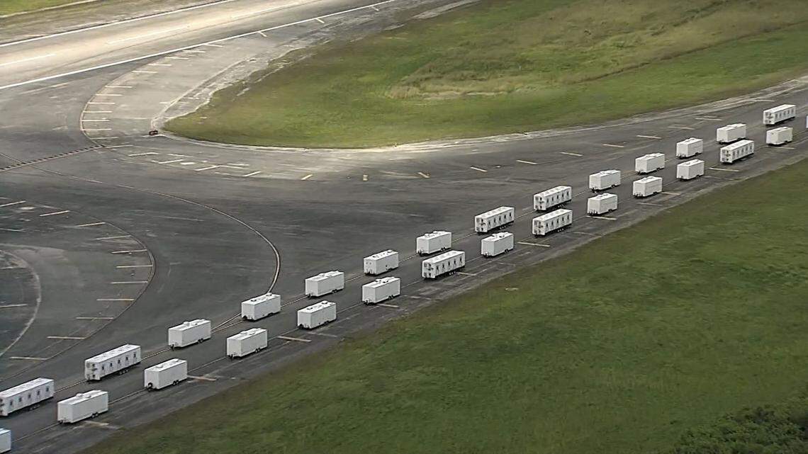 Ochopee, Fla., June 22, 2025 - Trailers line up on the runway of the old Dade-Collier Training and Transition Airport, originally the site of a failed plan to build a massive international airport, as construction of ‘Alligator Alcatraz’ continues.