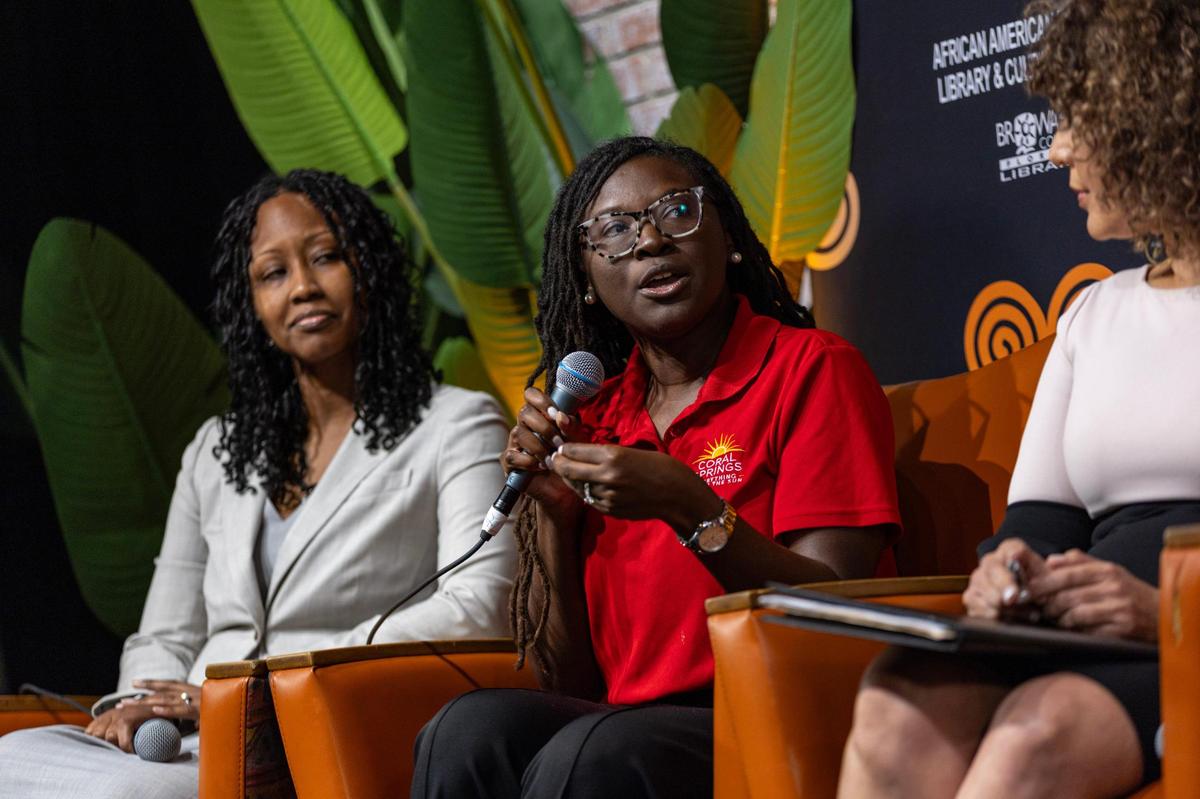 Coral Springs Commissioner Nancy Metayer Bowen, center, speaks as ACLU of Florida Executive Director Bacardi L. Jackson, right, and President, Broward County Black Chamber of Commerce Shaheewa Jarrett Gelin, Esq., left, listen during the Out of Many, One Community: Combating Anti-Immigrant Rhetoric panel discussion hosted by South Florida People of Color at the African-American Cultural Research Center on Thursday, October 17, 2024, in Miami, Fla.