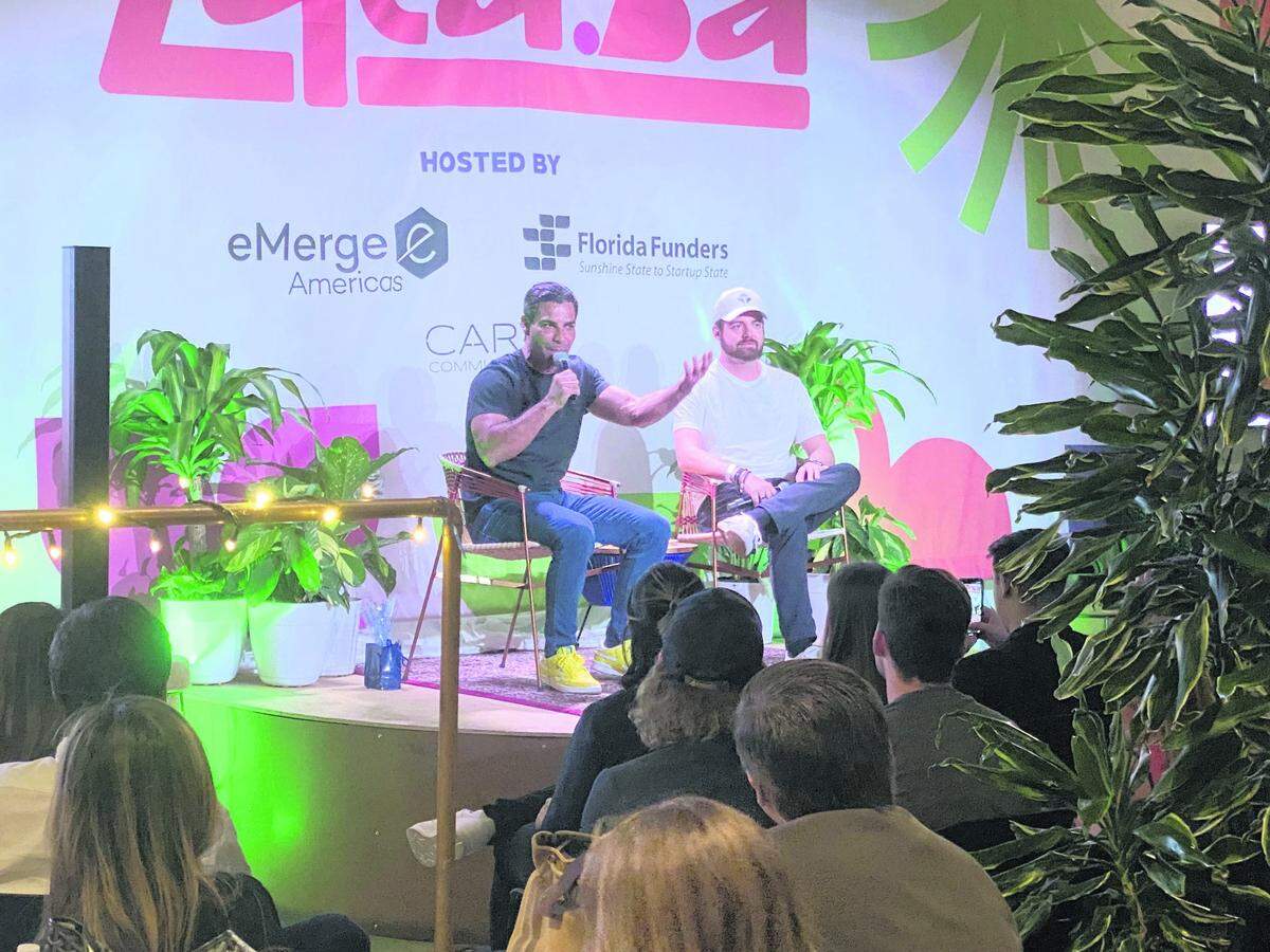 Miami Mayor Francis Suarez, left, and Blockchain.com co-founder and CEO Peter Smith speak at an event hosted by eMerge Americas and Florida Funders during Miami Art Week.