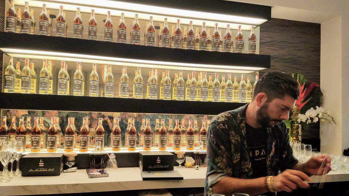 A bartender whips up delicious - and we do mean delicious - rum drinks for the crowd before the show. Designated drivers encouraged.