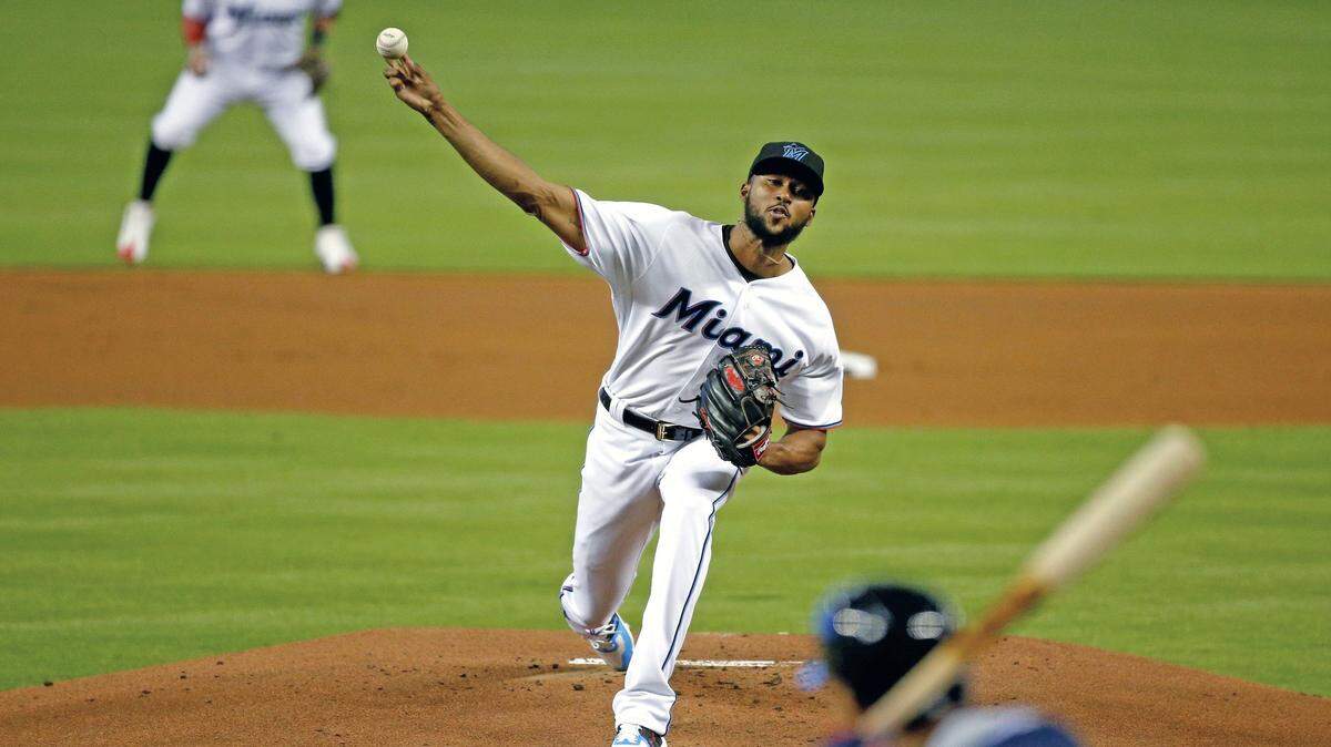 Miami Marlins starting pitcher Sandy Alcantara (22) throws a pitch in the first inning as the Miami Marlins host the Cleveland Indians at Marlins Park on Tuesday, April 30, 2019.