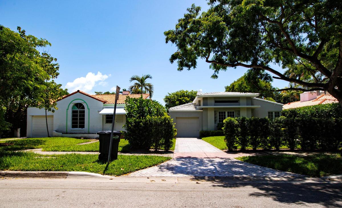 Lester Avery designed the 1735 Lenox Ave. residence, pictured on the left sitting next to a modern house in the Palm View Historic District of Miami Beach. The architect also designed Jackie Gleason’s Miami Beach residence. 