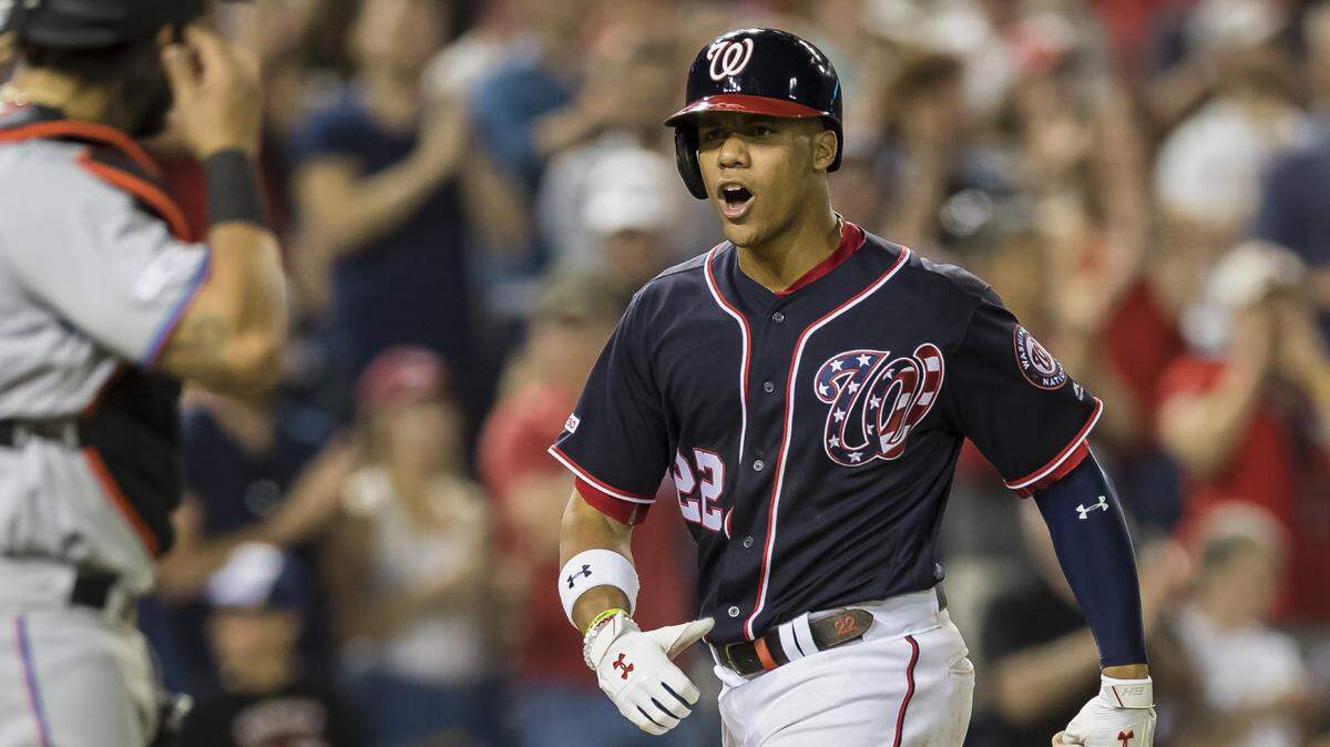 WASHINGTON, DC - MAY 24: Juan Soto #22 of the Washington Nationals celebrates after hitting the game winning three-run home run against the Miami Marlins during the eighth inning at Nationals Park on May 24, 2019 in Washington, DC. (Photo by Scott Taetsch/Getty Images)