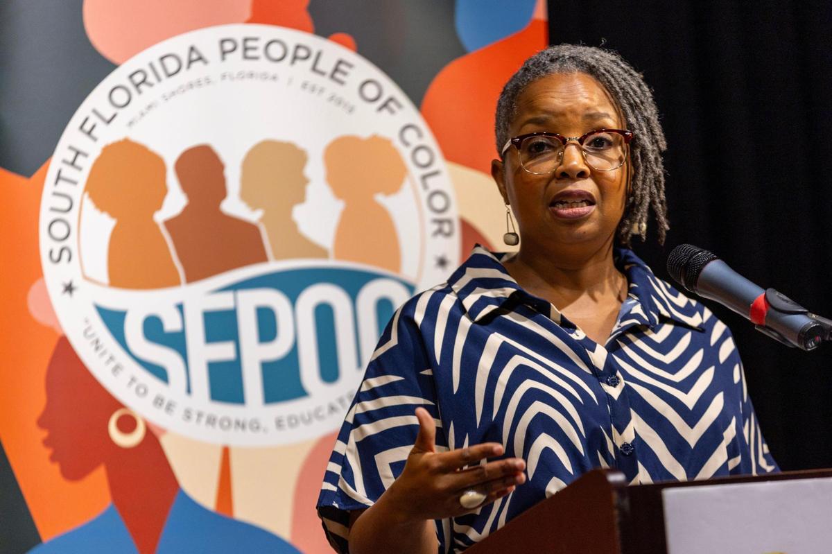 Moderator Tameka Bradley Hobbs speaks during the Out of Many, One Community: Combating Anti-Immigrant Rhetoric panel discussion hosted by South Florida People of Color at the African-American Cultural Research Center on Thursday, October 17, 2024, in Miami, Fla.