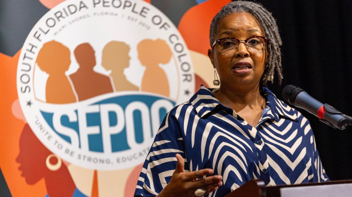 Moderator Tameka Bradley Hobbs speaks during the Out of Many, One Community: Combating Anti-Immigrant Rhetoric panel discussion hosted by South Florida People of Color at the African-American Cultural Research Center on Thursday, October 17, 2024, in Miami, Fla.