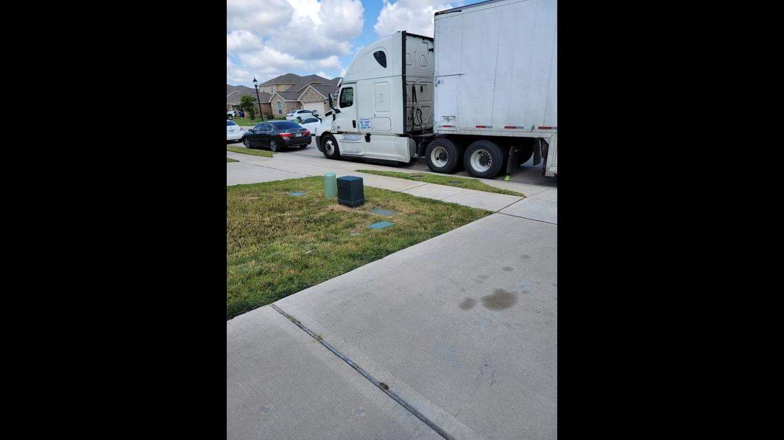 The van shows up at the Khan residence on moving day.