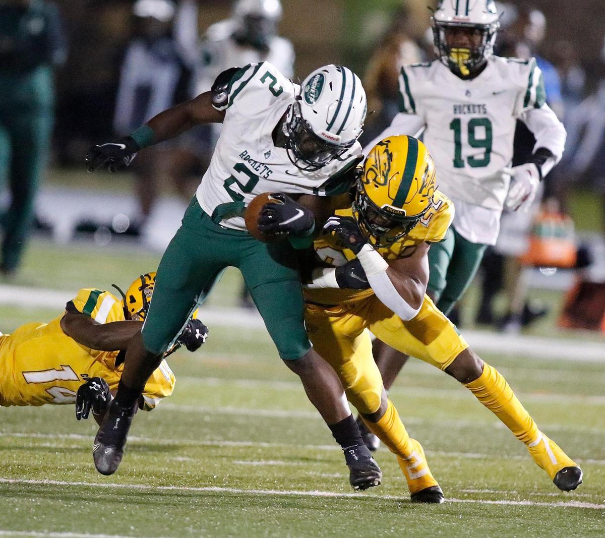 Miami Central Rockets running back Ghana Oboh (2) plays against Killian Cougars during the FHSAA Region 4-5A high school football championship on Saturday, November 27, 2021 at Tropical Park in Miami. Andrew Uloza / for THE MIAMI HERALD