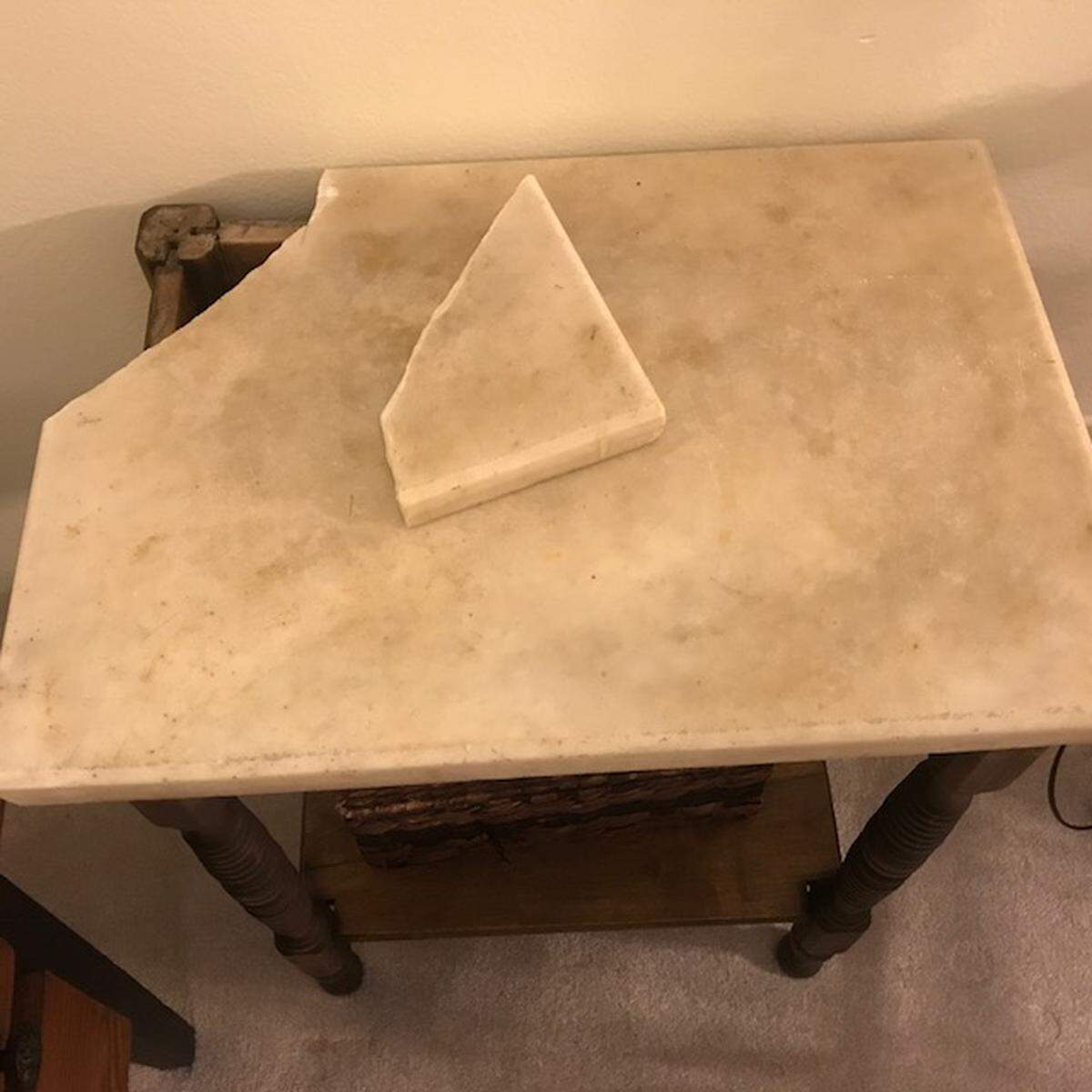 Jan Little said this damage to an expensive table occurred during her move.