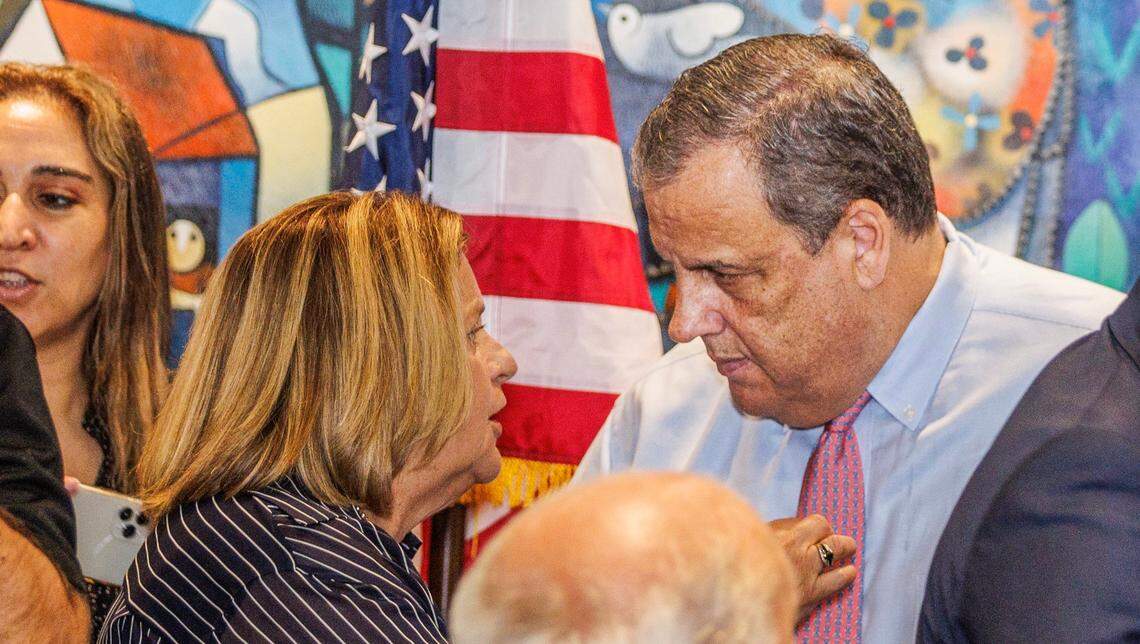 Republican presidential candidate Chris Christie chats with former Congresswoman Ileana Ros-Lehtinen during a town hall meeting at Casa Cuba restaurant in South Miami, on Friday, Aug.18, 2023.