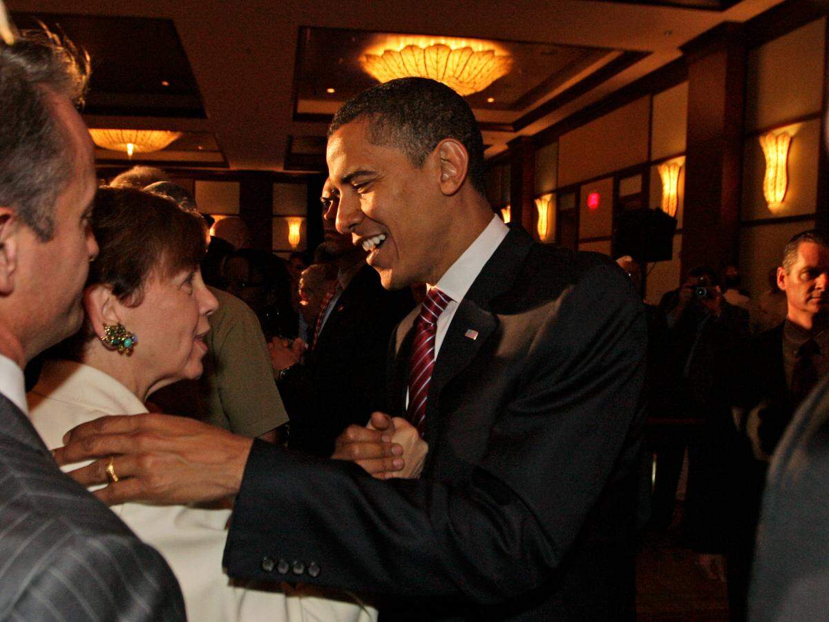 U.S. Sen. Barack Obama greets Adrienne Arsht at an event celebrating Cuban Independence Day at the InterContinental Miami on May 23, 2008.