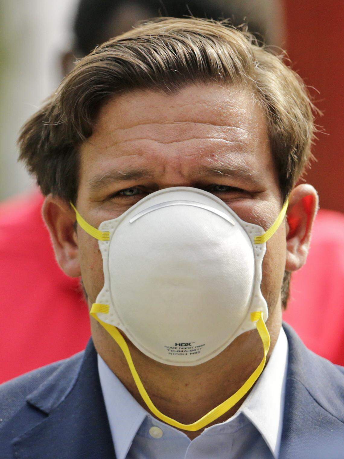 Florida Gov. Ron DeSantis wears a protective mask during a press conference at the Urban League of Broward County on Friday, April 17, 2020, in Fort Lauderdale to announce Florida’s first two walk-through coronavirus testing sites. The sites will open for testing on Saturday and will start with 200 tests per day, DeSantis said.
