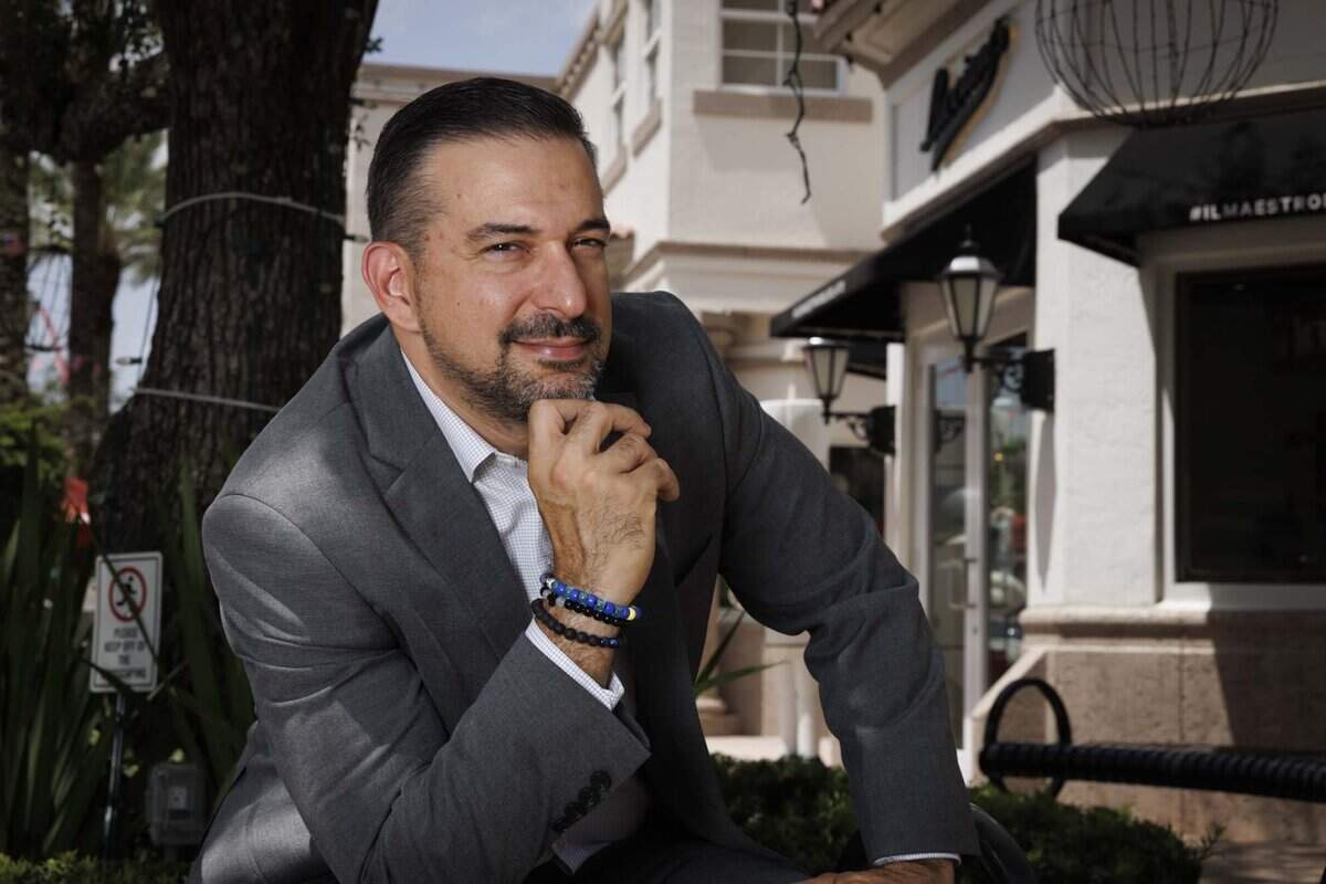 Adam Cervera, who is running for Broward County School Board, poses at Weston Town Center on Thursday, July 9, 2026, in Weston, Fla.