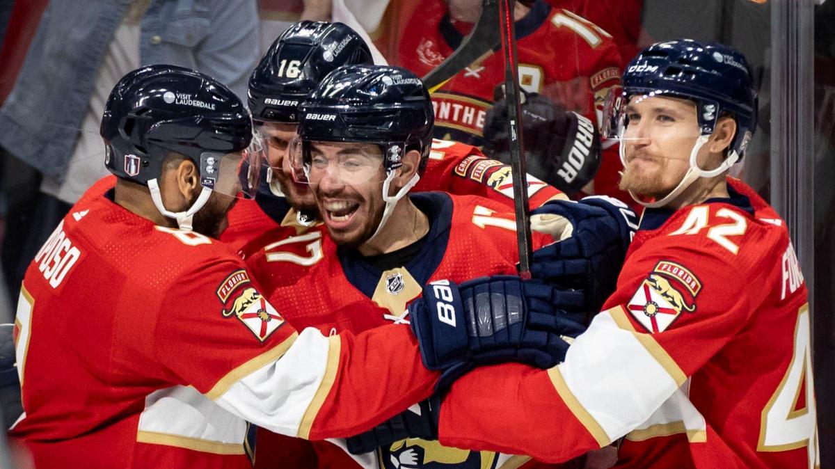 Sunrise, Florida, June 10, 2024 - Florida Panthers center Evan Rodrigues (17), center, is swamped by teammates after he scored the Go ahed goal to make the score 2-1 Panthers in the third period of play in Game 2 of the Stanley Cup Final.