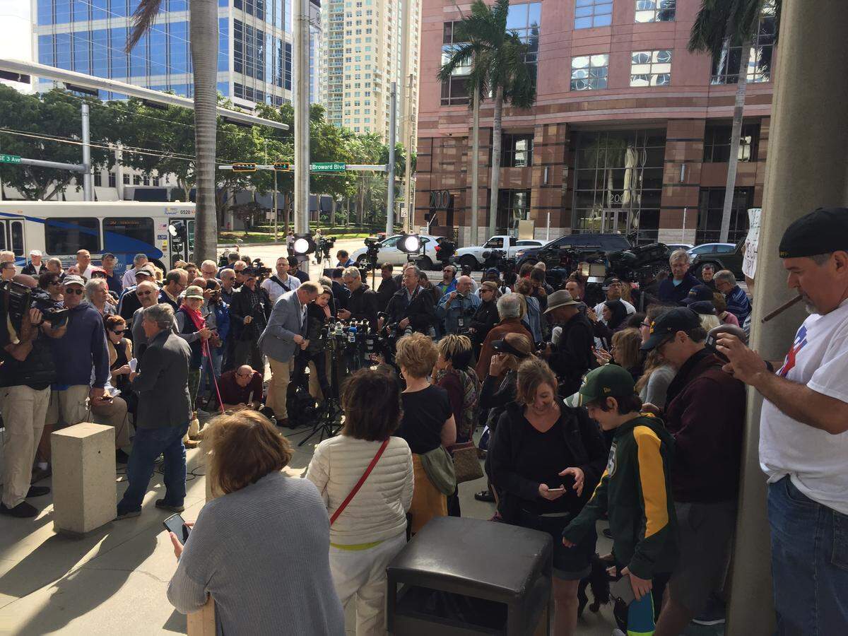 News media gather outside the federal courthouse in Fort Lauderdale late Friday morning, awaiting the release of Roger Stone on bond following his arrest in Special Counsel Robert Mueller’s investigation.