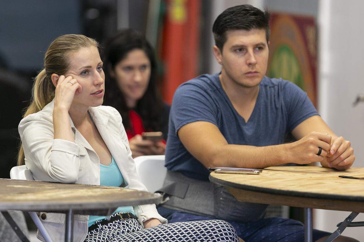 Yulia Akulov and her husband, Alex, attend a free meetup group for Amazon resellers in Miami on Saturday, December 15, 2018. The free Meetup aims to teach members how to successfully launch and sustain a business selling items on Amazon.