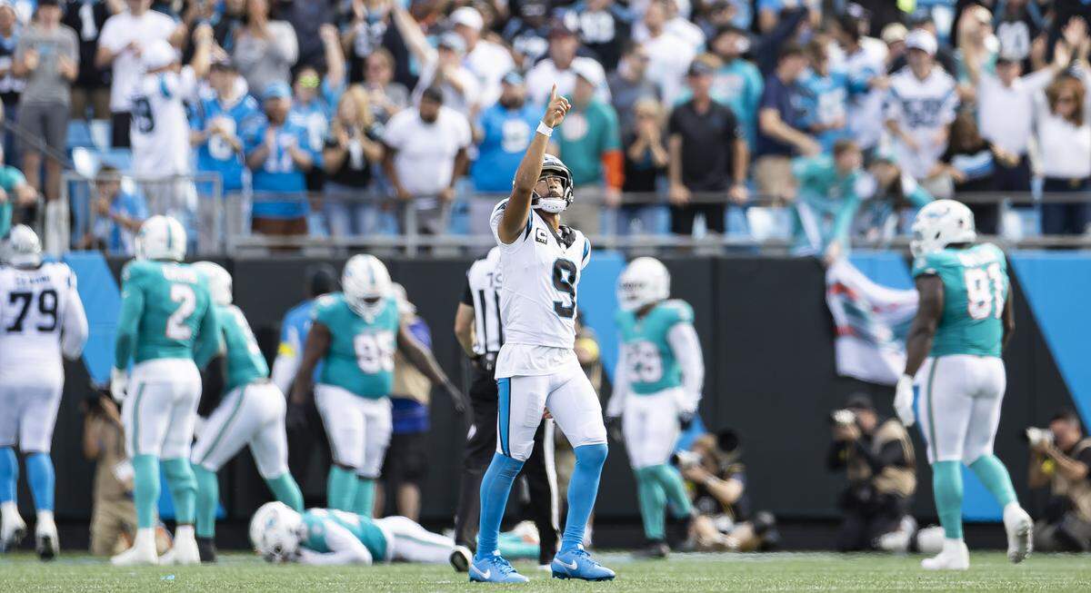 Carolina Panthers quarterback Bryce Young (9) reacts throwing a touchdown pass against the Miami Dolphins in the second half of their NFL game at the Bank of America Stadium on Sunday, Oct. 5, 2025, in Charlotte, N.C.