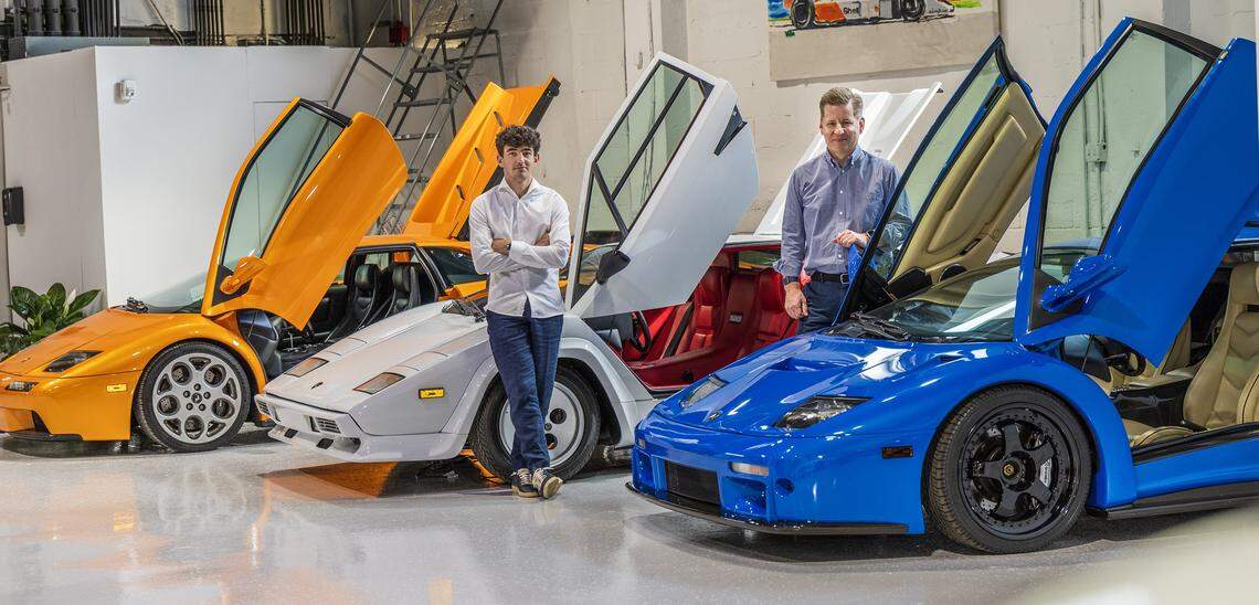 MCQ Markets CEO Curt Hopkins, right, and company co-founder Lachlan DeFrancesco stand by three Lamborghinis, including the iconic white 1986 Countach, center, 1 of 610 made. A similar car, same model, appeared on ‘Miami Vice’ in a season two chase scene.
