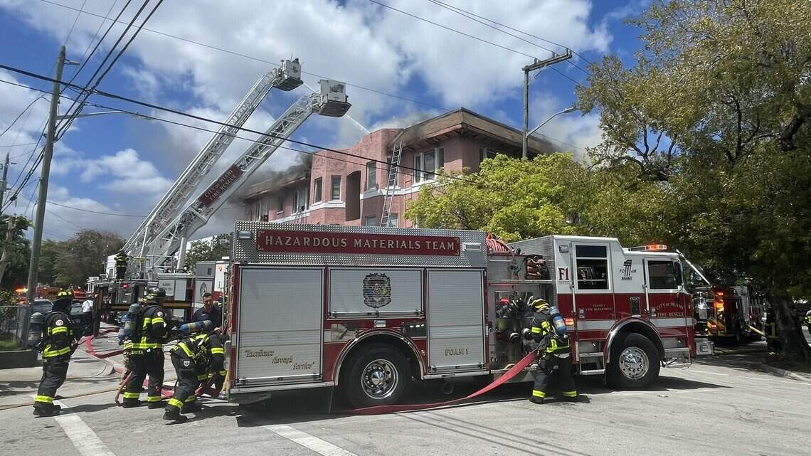Firefighters battle blaze at a nearly century-old apartment building in Little Havana