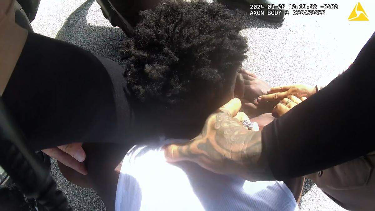 Photo captured from the Miami-Dade police body camera footage of its officers’ controversial Sunday, Sept. 8, 2024, traffic stop of Miami Dolphins star wide receiver Tyreek Hill.