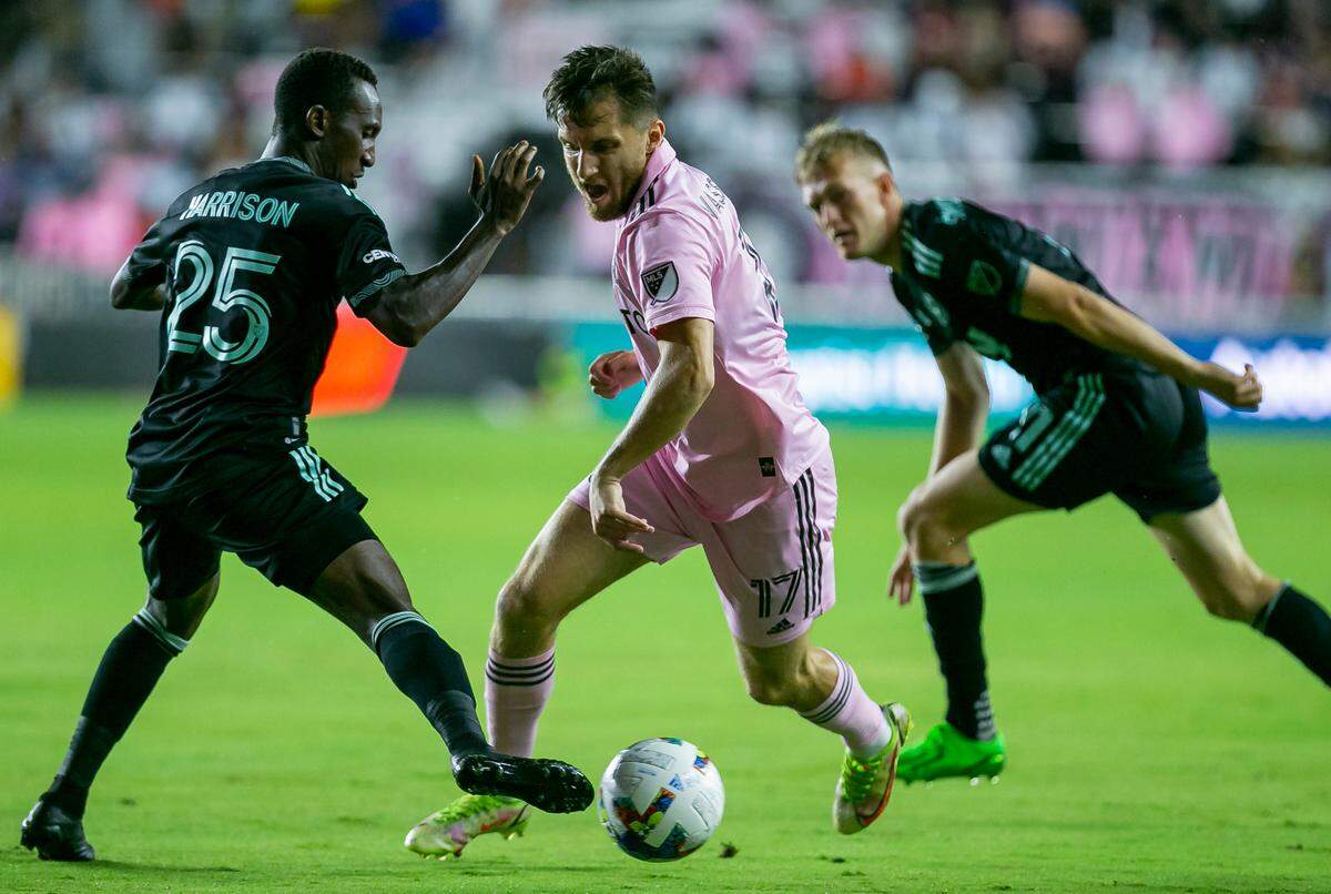 Inter Miami midfielder Indiana Vassilev (17) tries to make his way past Charlotte FC defender Harrison Afful (25) during the first half of their MLS soccer match at DRV PNK Stadium on Saturday, July 16, 2022 in Fort Lauderdale, Fla.