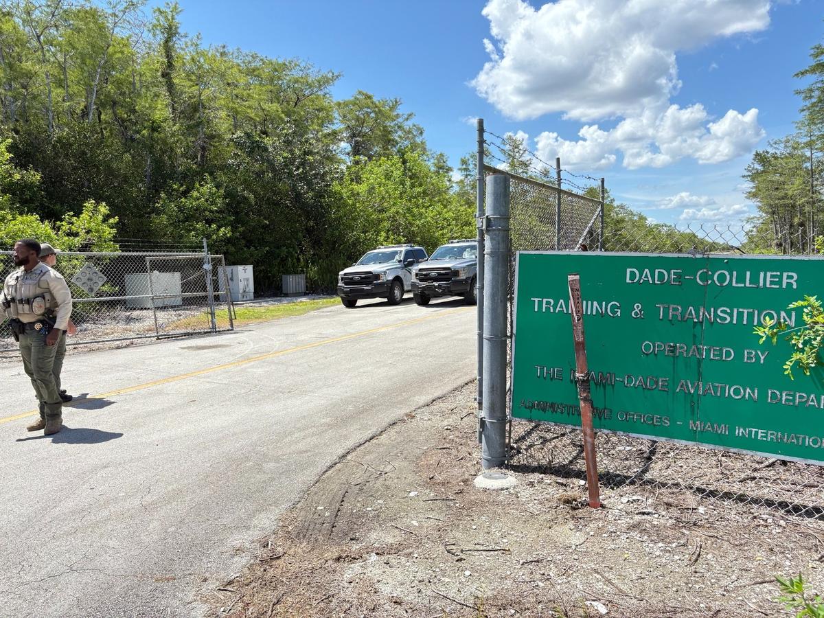 An officer with the Florida Fish and Wildlife Conservation Commission is seen outside the entrance to the site on Monday, June 23, 2025.