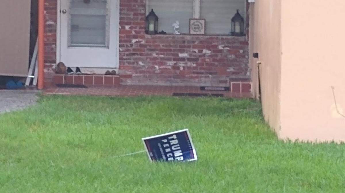 A mangled election sign on the lawn of Miami Springs home.