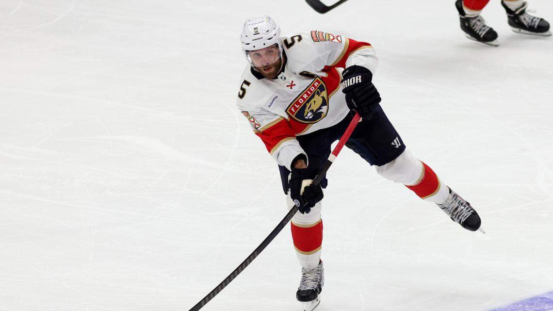 Nov 17, 2023; Anaheim, California, USA; Florida Panthers defenseman Aaron Ekblad (5) passes during the second period against the Anaheim Ducks at Honda Center. Mandatory Credit: Jason Parkhurst-USA TODAY Sports