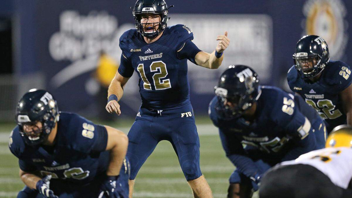 FIU Panthers quarterback James Morgan (12) signals in the first quarter as FIU Panthers host Arkansas Pine-Bluff at Ricardo Silva Stadium in Miami on Saturday, September 29, 2018.