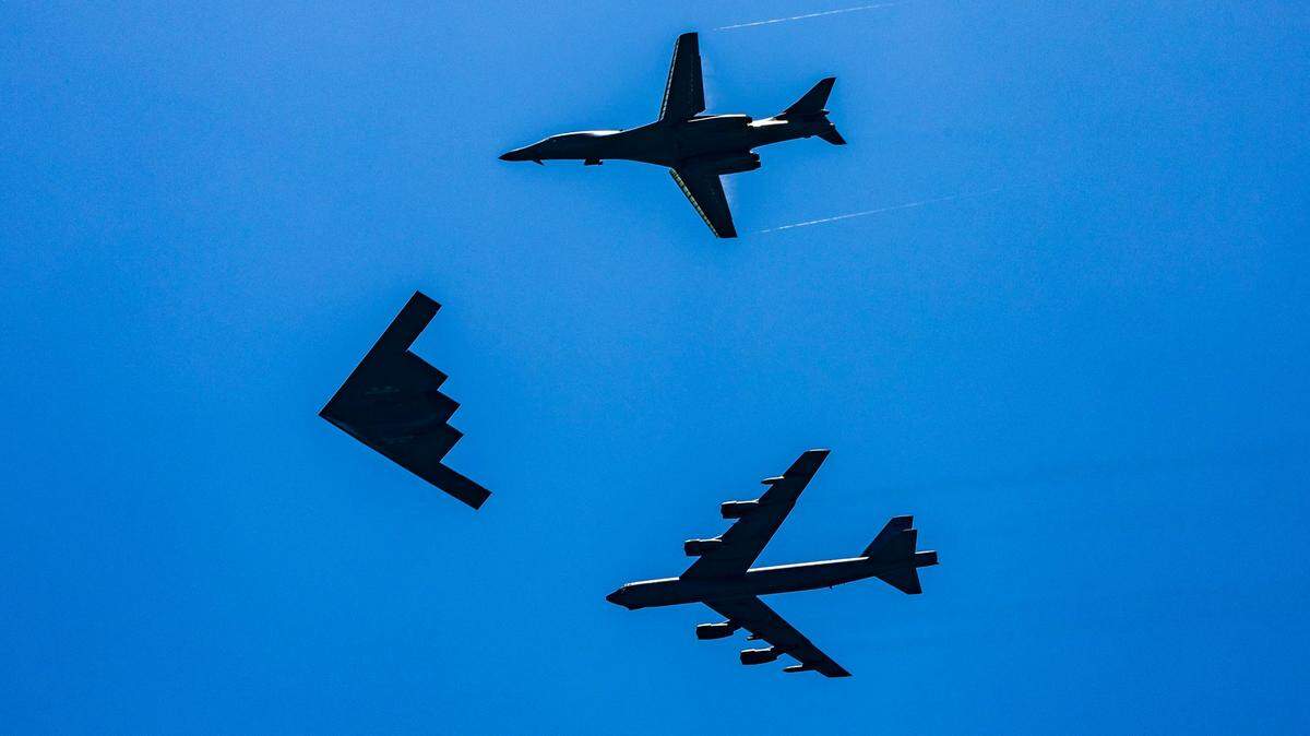A U.S. Air Force Tri-Bomber formation flies over South Beach during the 2025 Hyundai Air & Sea Show.
