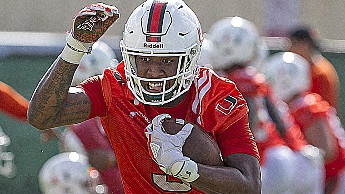 Tight end Brevin Jordan runs drills during the second day of University of Miami fall football camp  at Greentree Field in Coral Gables on Sunday, August 5, 2018. Jordan, a freshman considered the top prep tight end in the nation last year, will have to help compensate for the loss of junior Michael Irvin II, who underwent knee surgery Wednesday.