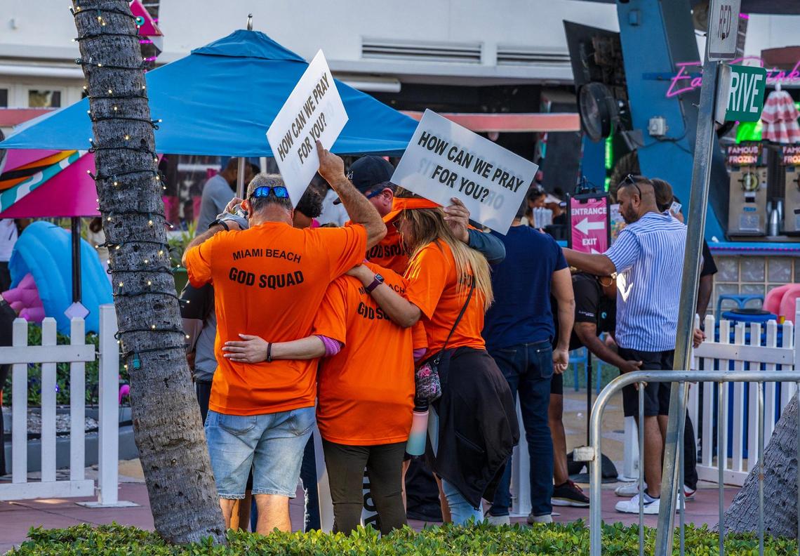 Members of the “God Squad” hold a pray in front of the Clevelander Hotel, on Ocean Drive, during spring break, in Miami Beach, Florida. on Saturday March 22, 2025.