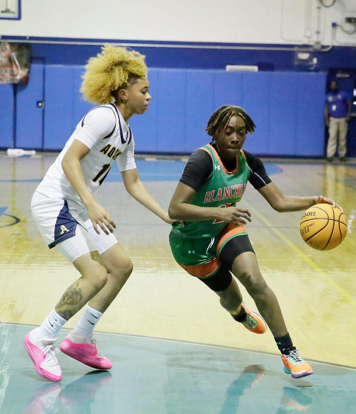 Blanche Ely Lady Tigers Teriyah McFadden controls the ball during BCAA Big 8 basketball girls final game against Thomas Aquinas Lady Raiders on Saturday, January 27, 2024 at Fort Lauderdale HS in Fort Lauderdale. Andrew Uloza / for Miami Herald