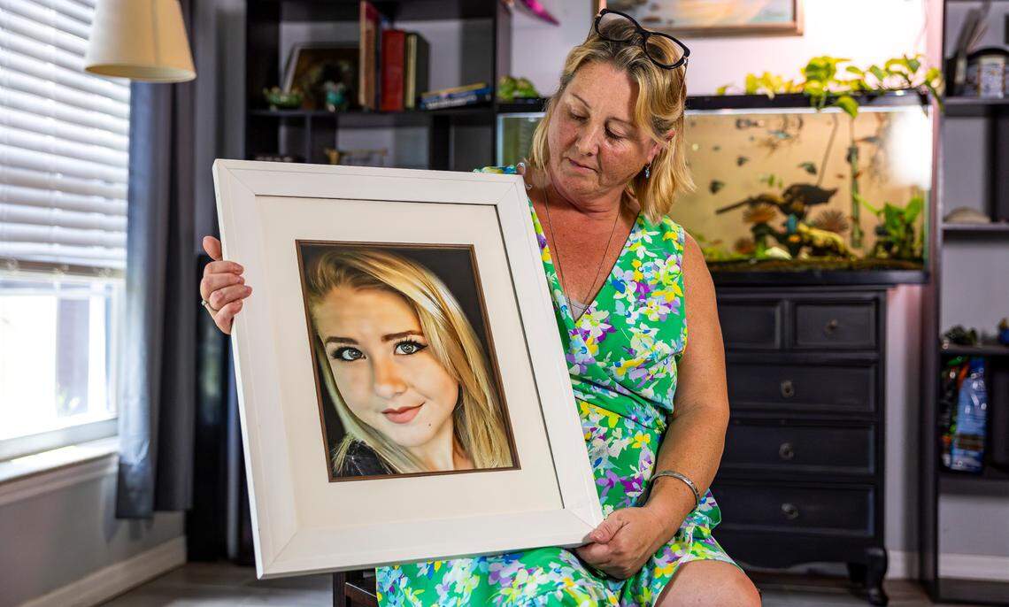 Amy Brunelle holds a photo of her daughter, Madison, 18, at her home on Thursday, April 10, 2025, in Fort Pierce, Fla. The troubled girl stepped in front of a Brightline train during a test run of the new train in 2017 in Boca Raton.