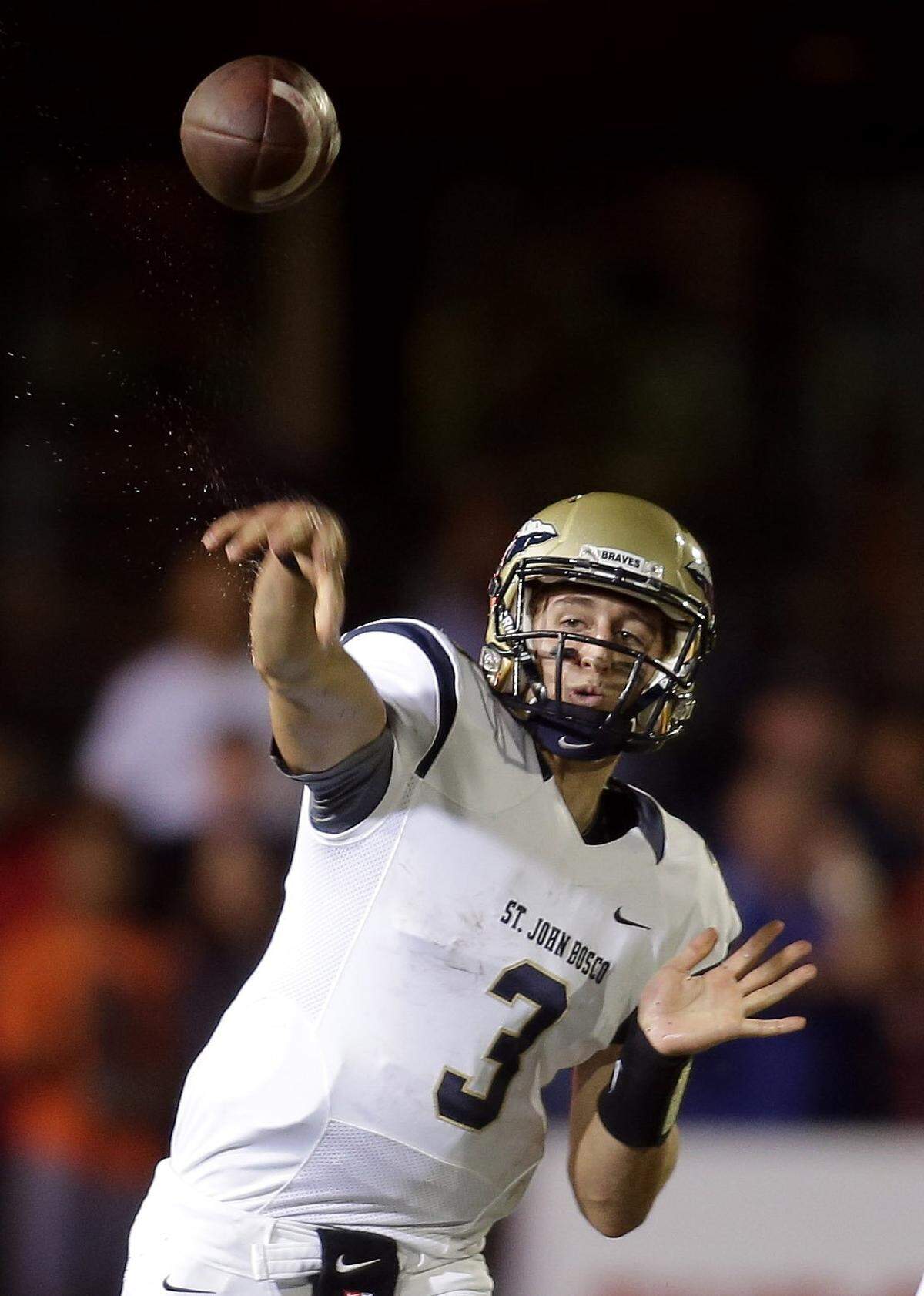 St. John Bosco quarterback John Rosen releases a pass during the first half of a high school football game against Bishop Gorman on Friday, Sept. 26, 2014, in Las Vegas.
