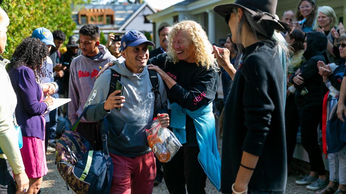 Migrants leave Martha’s Vineyard for military base on Cape Cod