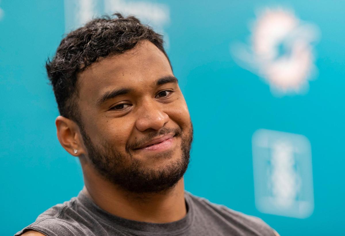 Miami Dolphins quarterback Tua Tagovailoa (1) speaks to reporters after team practice at the Baptist Health Training Complex on Wednesday, Nov. 9, 2022, in Miami Gardens, Fla.