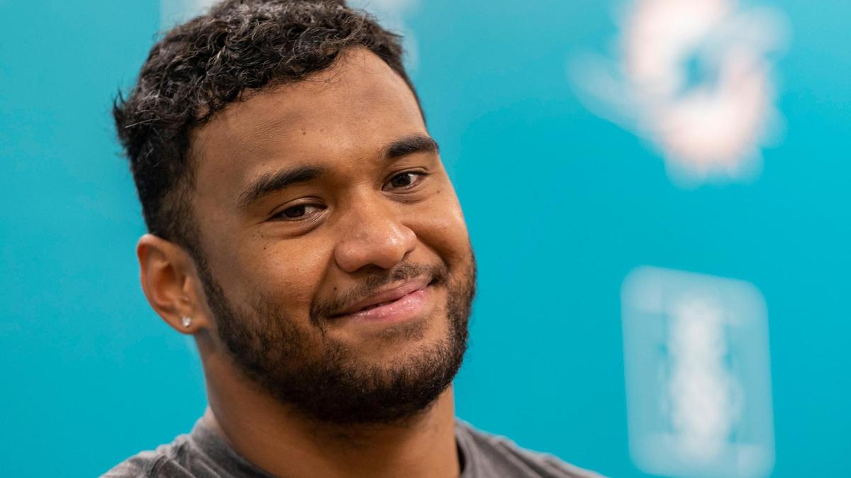 Miami Dolphins quarterback Tua Tagovailoa (1) speaks to reporters after team practice at the Baptist Health Training Complex on Wednesday, Nov. 9, 2022, in Miami Gardens, Fla.