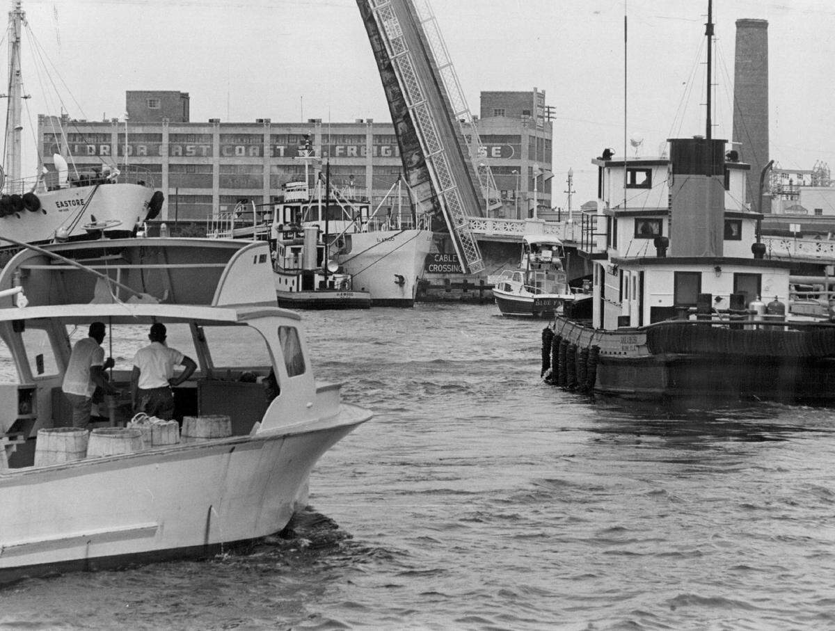 In 1965, heavy boat traffic along the Miami River ahead of a hurricane.
