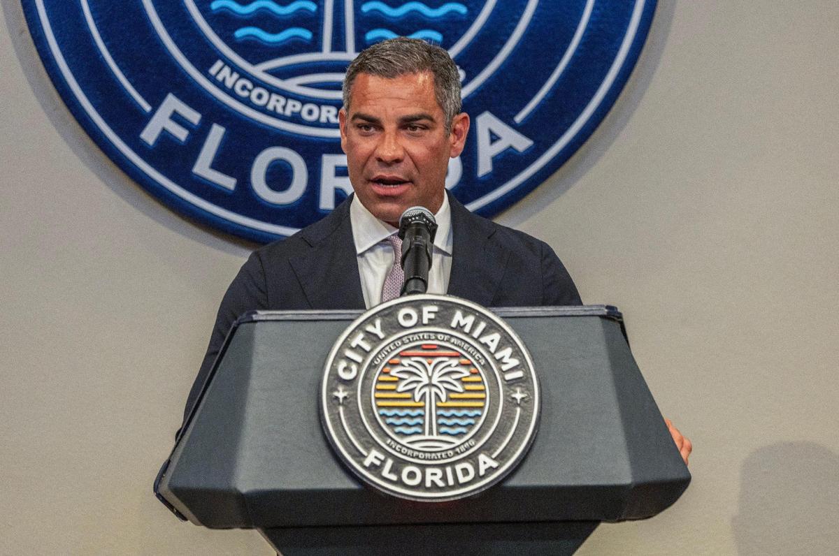 Mayor Francis Suarez welcomes the newly elected District 4 Commissioner Ralph Rosado during his swearing-in ceremony at Miami City Hall on Tuesday, June 10, 2025.