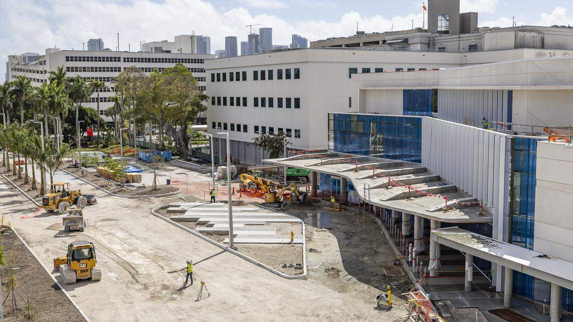 Construction crews work on the exterior of Jackson Memorial Hospital's new emergency department on Thursday, March 5, 2026, in Miami, Fla. The new facility doubles the size of their current emergency room and is expected to reduce patient wait times.