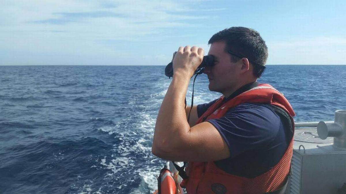 Coast Guardsman searches for the missing diver, Toronto filmmaker Rob Stewart, who perished in a diving accident in January 2017. This was day one of the search. Stewart’s body was eventually found in 220 feet of water on Feb. 3, 2017.