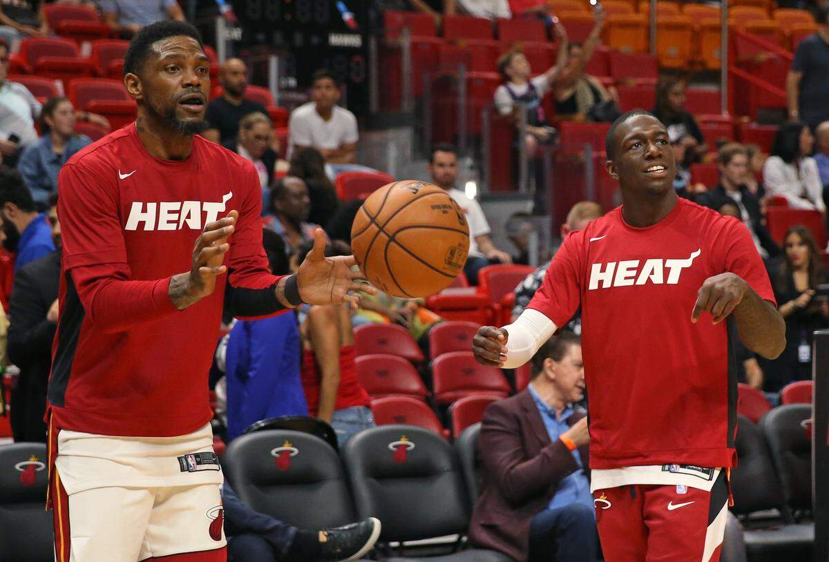 From left to right, Miami Heat forward Udonis Haslem (40) and Miami Heat guard Kendrick Nunn (25) talk before the start of an NBA basketball regular season game against the Atlanta Hawks at the AmericanAirlines Arena on Tuesday, October 29, 2019 in Miami.